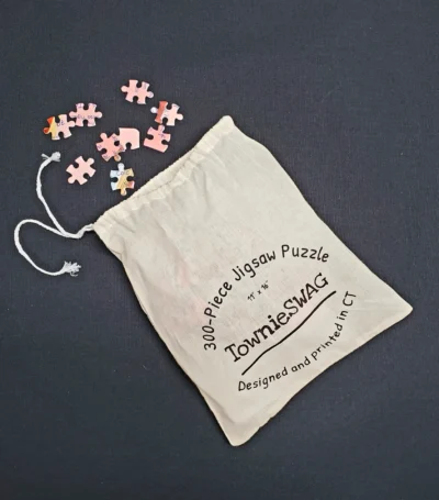 A bag of puzzle pieces with the missing piece.