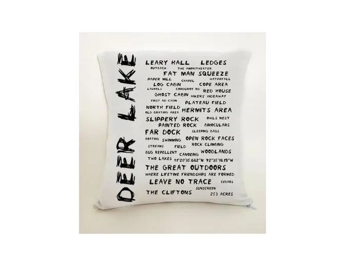 A pillow with the words " deer lake ".