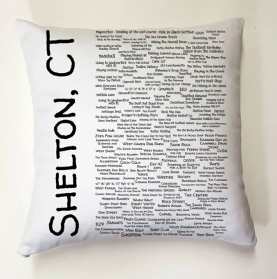 A pillow with the names of all the places in shelton, ct.