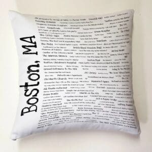 A pillow with boston, ma written on it.