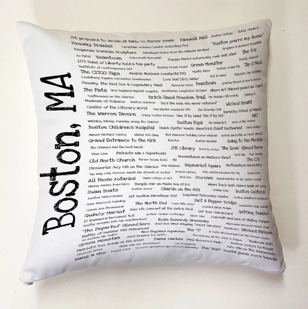 A pillow with boston, ma written on it.