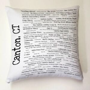 A pillow with the words canton, ct written on it.