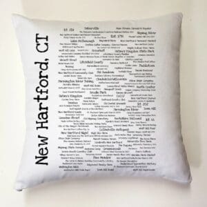 A pillow with the words " new hartford, ct ".