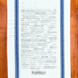 A blue striped towel with trivia about Brattleboro, Vermont