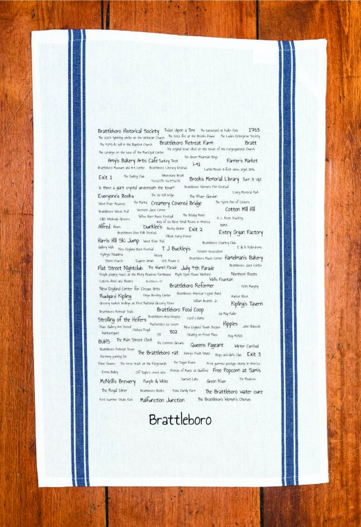 A blue striped towel with trivia about Brattleboro, Vermont
