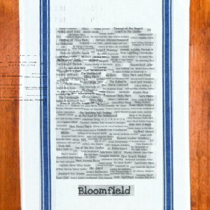 A blue striped towel with trivia about Bloomfield, Connecticut